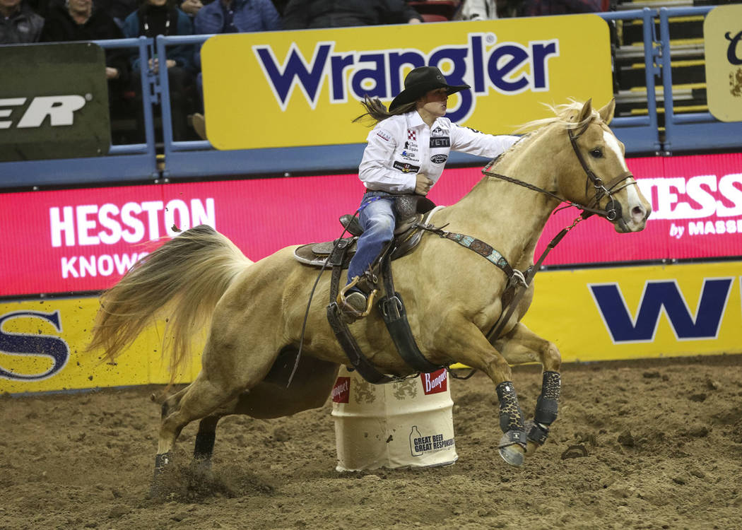 Hailey Kinsel of Cotulla, Texas (53) competes in the barrel racing event during the ninth go-ro ...