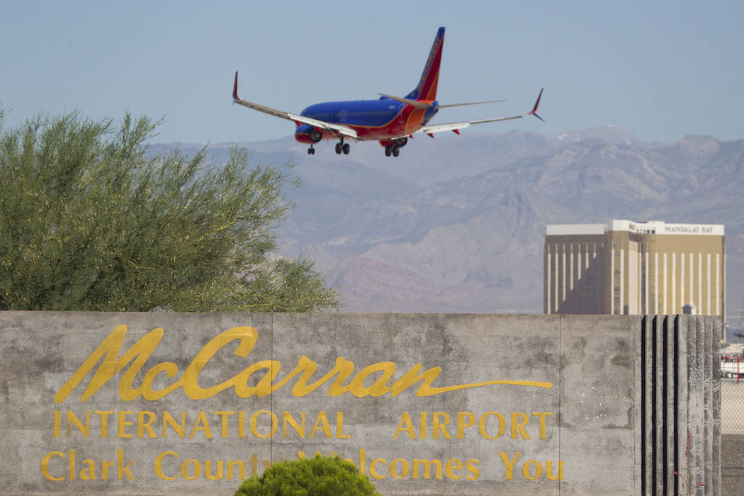 Debris in the mechanisms of an airport baggage claim carousel appear to have caused a small fir ...