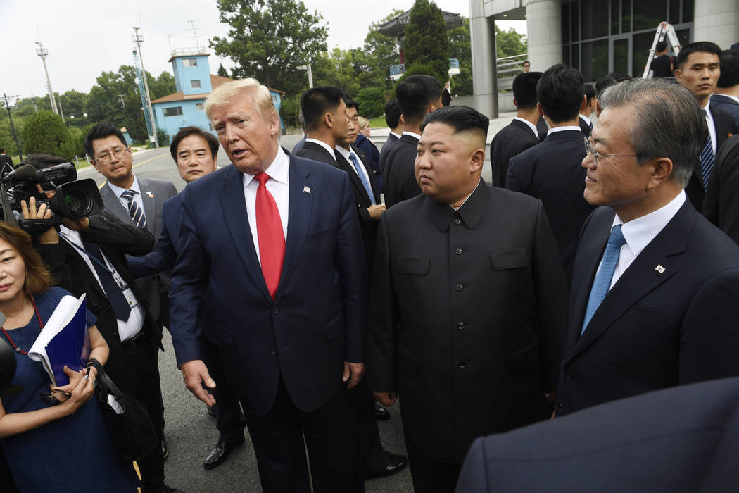 President Donald Trump meets with North Korean leader Kim Jong Un, with South Korean President ...