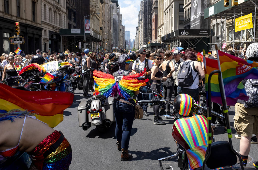 People line up to participate in the LBGTQ Pride march Sunday, June 30, 2019, in New York. (AP ...