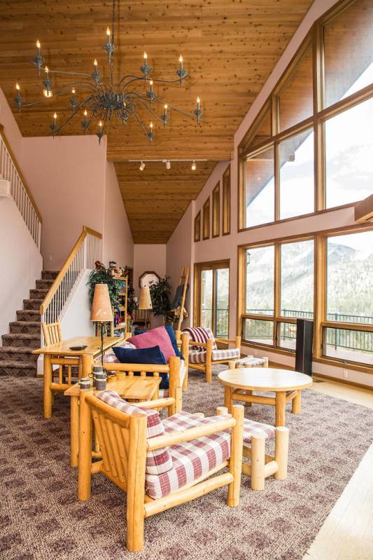 The living room has high ceilings. (Tonya Harvey Real Estate Millions)