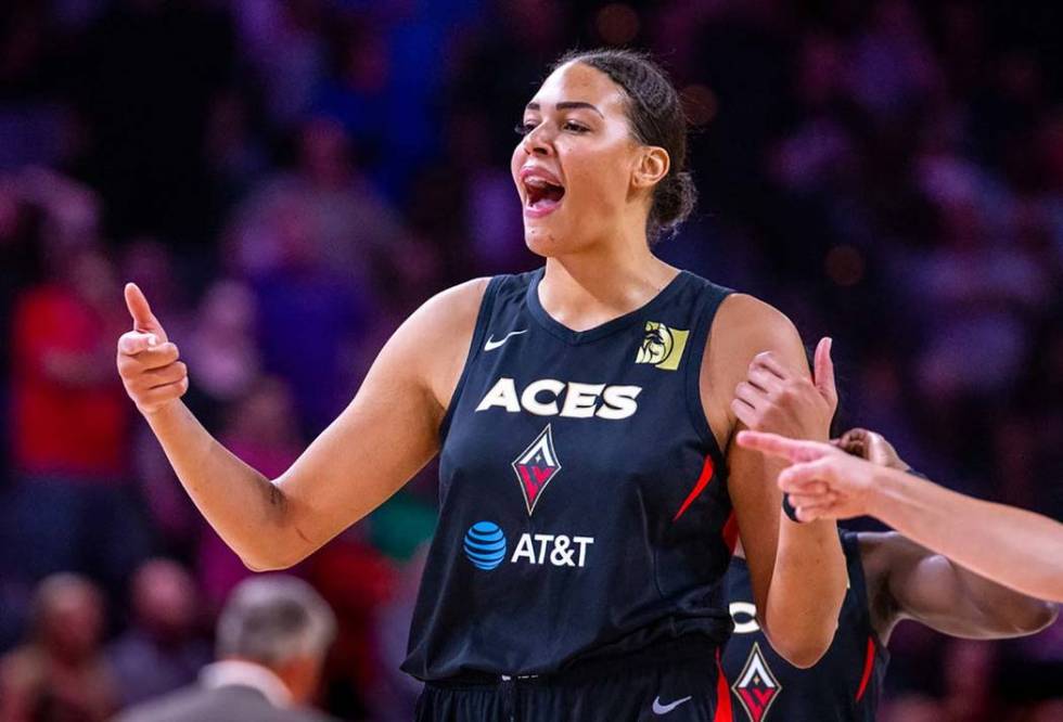 Las Vegas Aces center Liz Cambage (8) pumps up her teammates during the overtime period versus ...