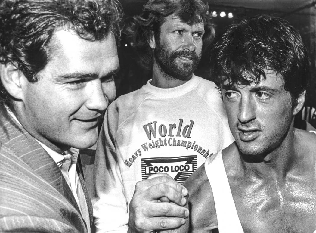 Sylvester Stallone, right, arm wrestles Stephan Tanstad at the Las Vegas Hilton in Las Vegas in ...