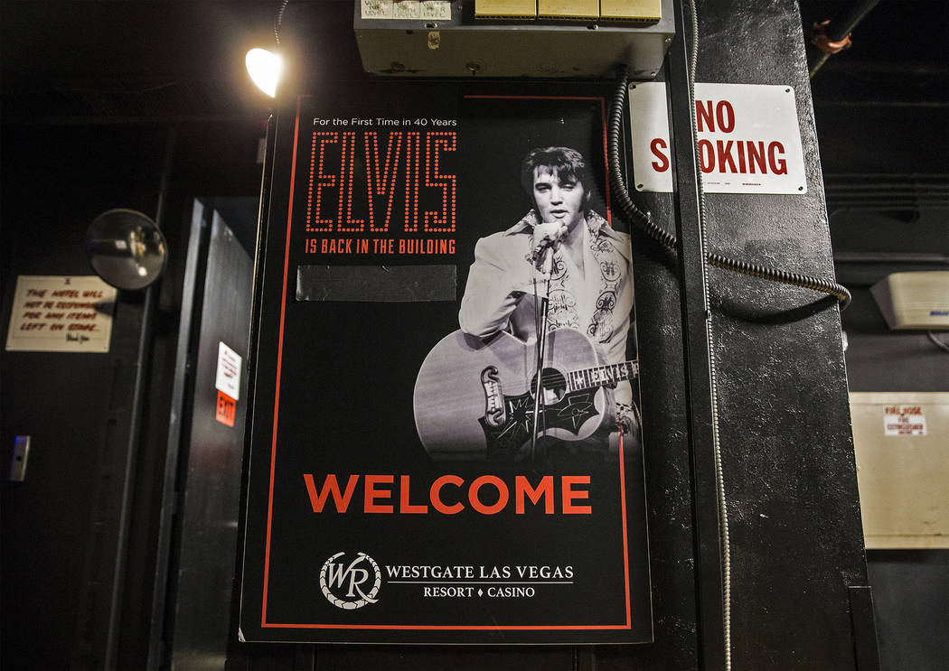 A poster of Elvis Presley hangs backstage at the International Theater on Thursday, July 11, 20 ...