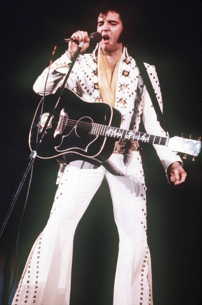 Elvis Presley sings during a 1973 concert. (AP file)