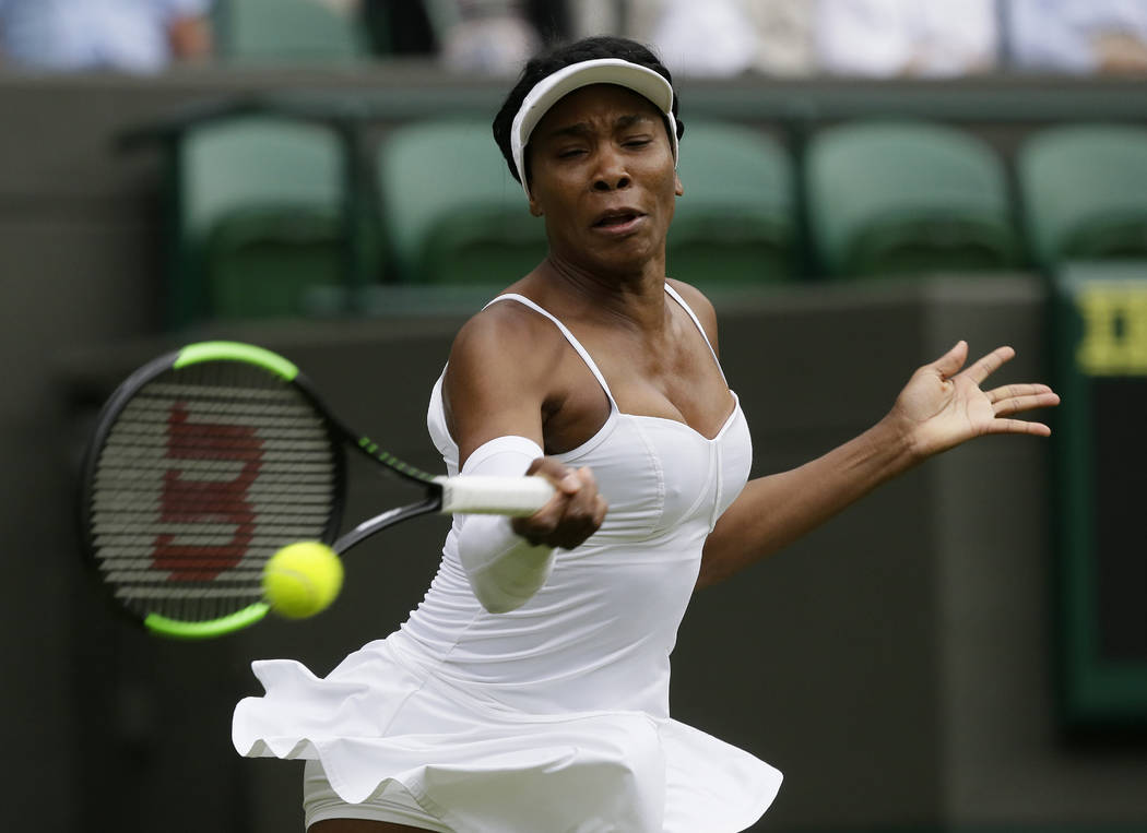 United States's Venus Williams returns to United States' Cori "Coco" Gauff in a Women ...