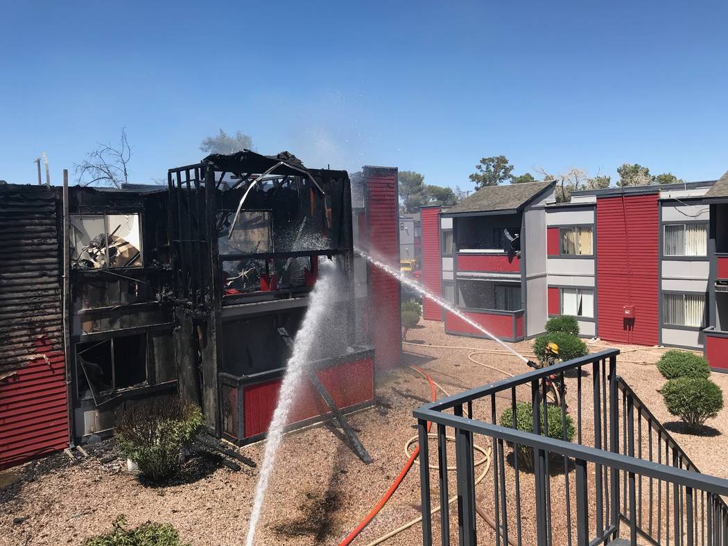 The Clark County and Las Vegas fire departments are fighting a fire at an apartment complex at ...