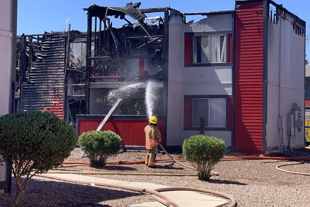 The Clark County and Las Vegas fire departments are fighting a fire at an apartment complex at ...