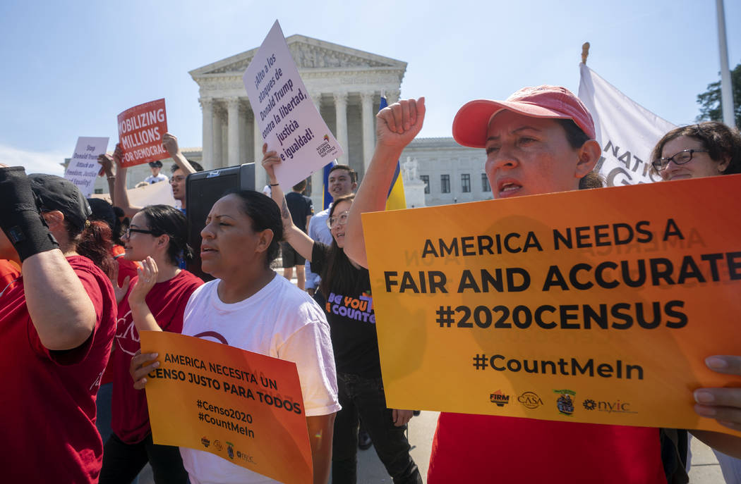 Demonstrators gather at the Supreme Court as the justices finish the term with key decisions on ...