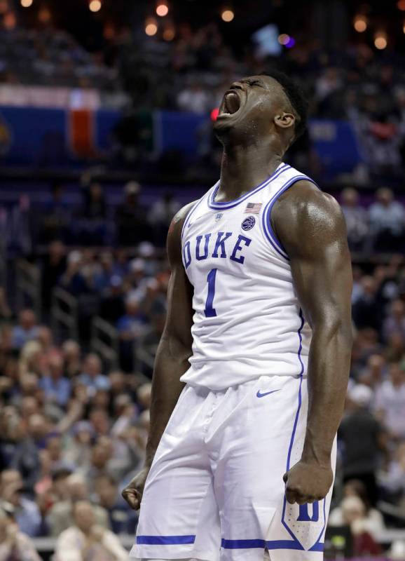 Duke's Zion Williamson (1) reacts after his basket against Syracuse during the first half of an ...