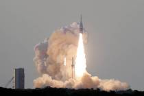 A NASA Orion spacecraft lifts off from pad 46 at the Cape Canaveral Air Force Station Tuesday, ...