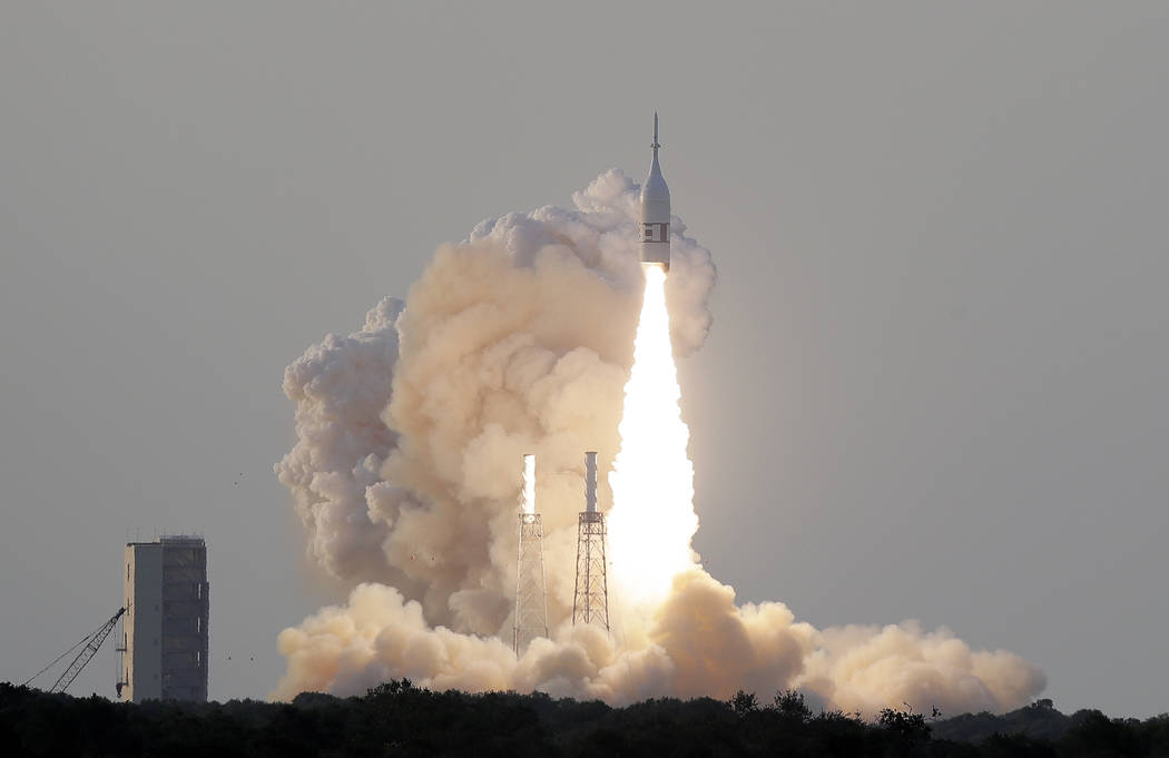 A NASA Orion spacecraft lifts off from pad 46 at the Cape Canaveral Air Force Station Tuesday, ...