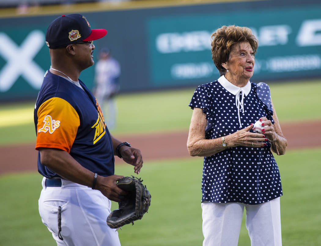 Ninety-five-year-old U.S. Marine Corps veteran Gloria Saucier, who served in World War II, righ ...