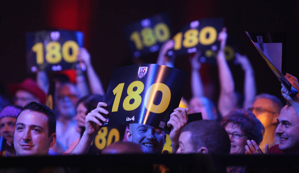 Spectators celebrate during the 2019 Dafabet US Darts Masters at Mandalay Bay on July 4, 2019 i ...