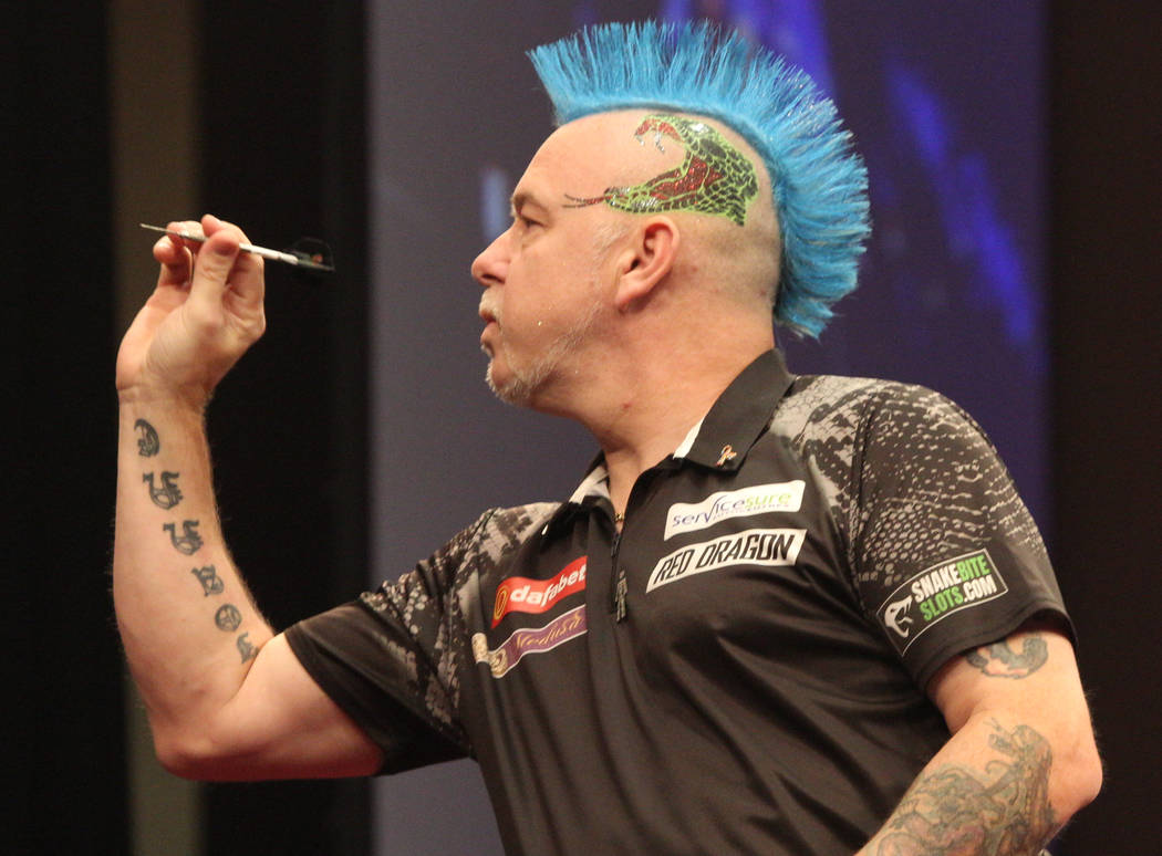 Peter Wright takes aim during the 2019 Dafabet US Darts Masters at Mandalay Bay on July 4, 2019 ...