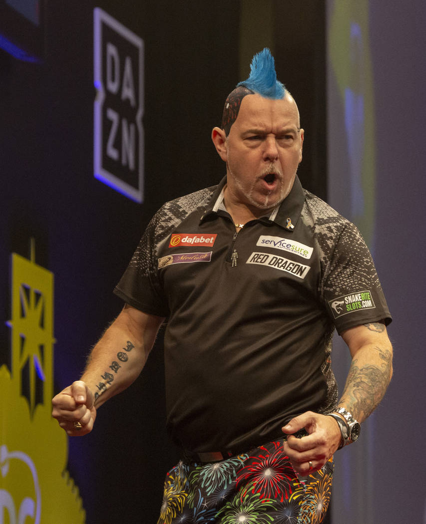 Peter Wright celebrates during the 2019 Dafabet US Darts Masters at Mandalay Bay on July 4, 201 ...