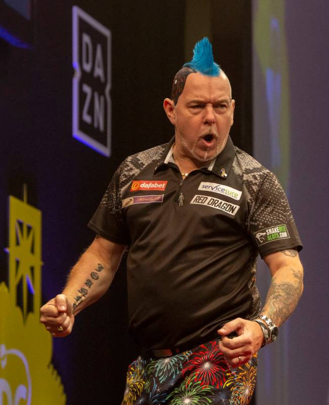 Peter Wright celebrates during the 2019 Dafabet US Darts Masters at Mandalay Bay on July 4, 201 ...