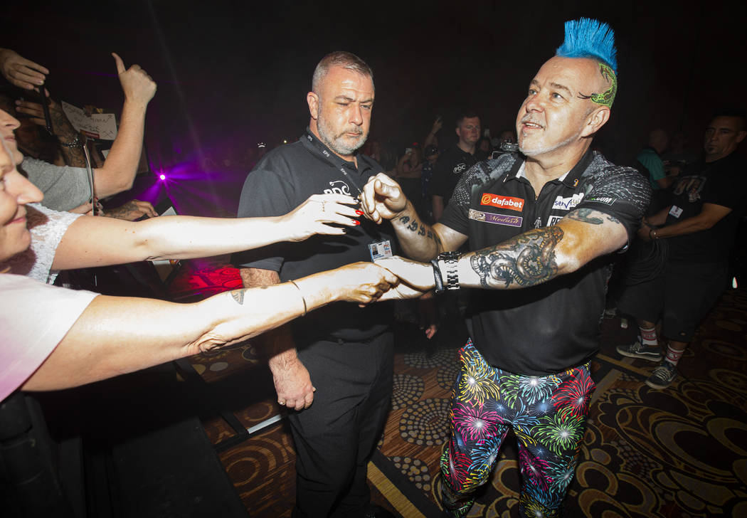 Peter Wright greets fans during the 2019 Dafabet US Darts Masters at Mandalay Bay on July 4, 20 ...