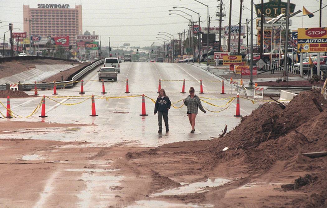 Bobbie Hines and Alexandria DeLong walk on Boulder Highway, near the Miracle Mile trailer park ...