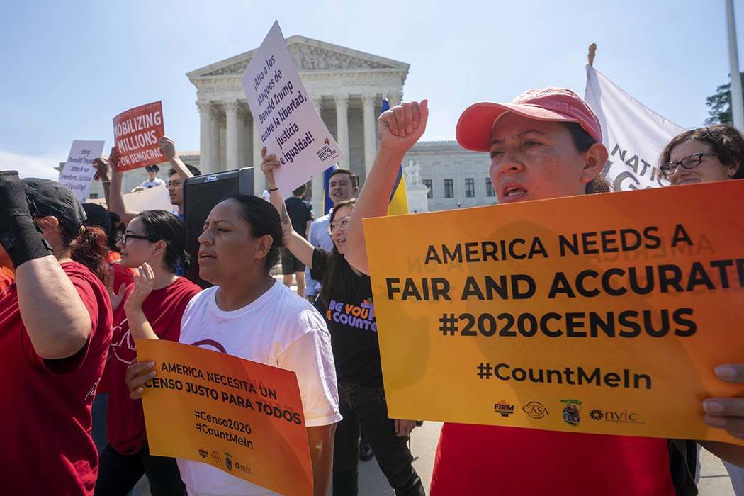 Demonstrators gather at the Supreme Court as the justices finish the term with key decisions on ...