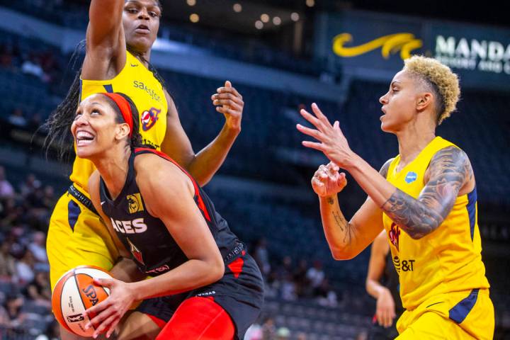 Las Vegas Aces forward A'ja Wilson (22) looks to the basket inside of Indiana Fever center Teai ...