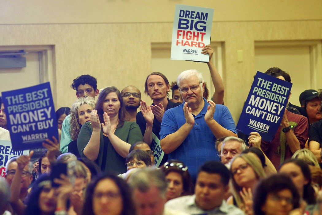 Supporters cheer as Democratic presidential candidate Sen. Elizabeth Warren, D-Mass., not pictu ...