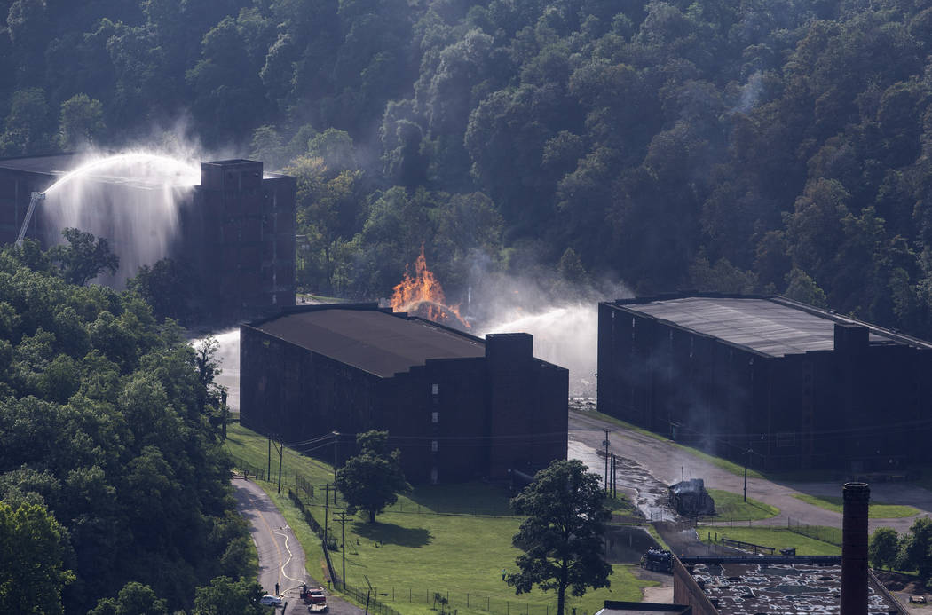 Flames and smoke rise from a bourbon warehouse fire at a Jim Beam distillery in Woodford Count ...