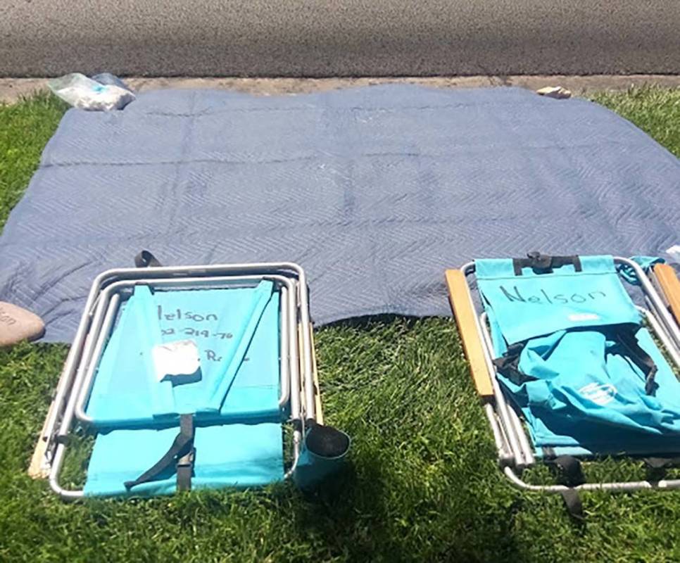 A blue blanket and some chairs held down by rocks marks the Nelson's spot for the annual Summer ...