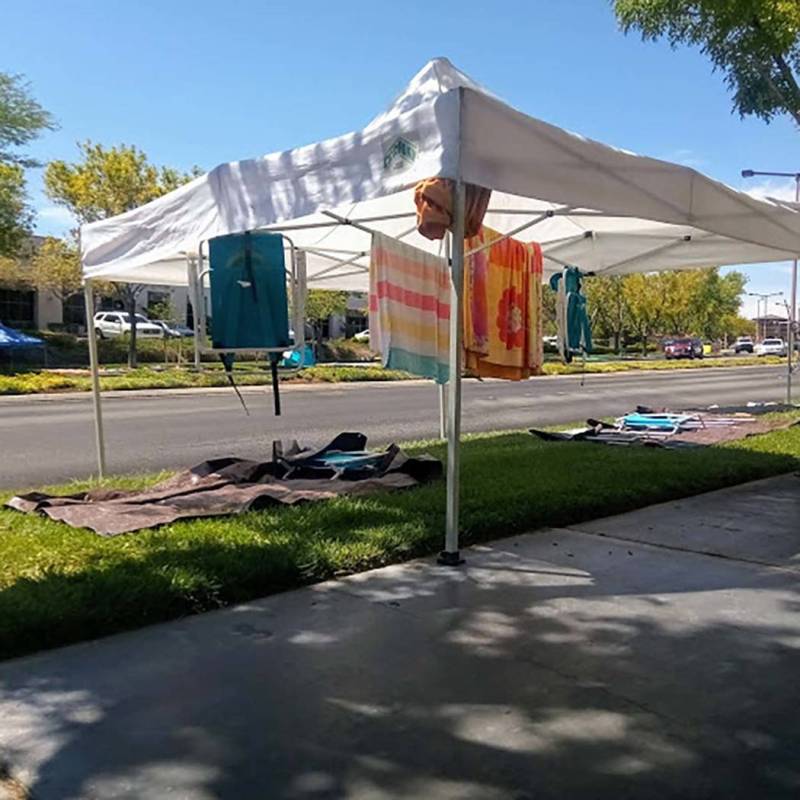 Canopies to provide shade form the sun abound along the parade route for the 25th annual Summer ...