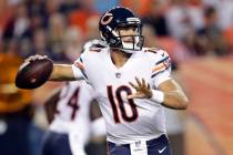 In this Aug. 18, 2018, file photo, Chicago Bears quarterback Mitchell Trubisky (10) throws agai ...