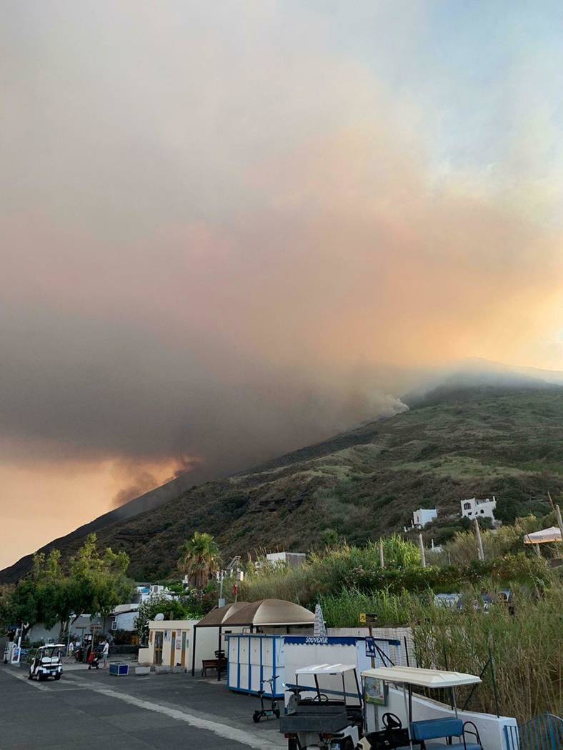 Smoke billows from the volcano on the Italian island of Stromboli, Wednesday, July 3, 2019. The ...