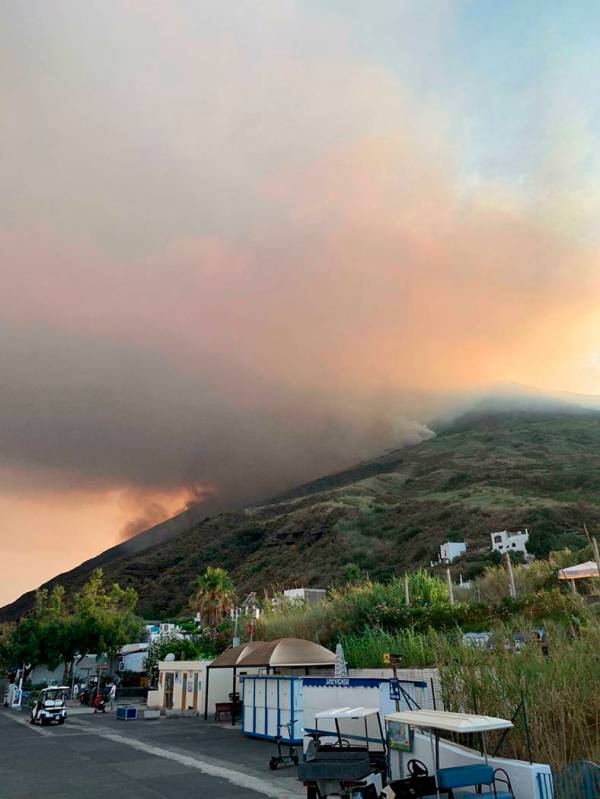 Smoke billows from the volcano on the Italian island of Stromboli, Wednesday, July 3, 2019. The ...