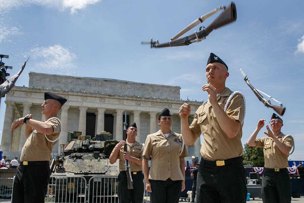 Navy Aviation Electronics Technician (AT3) Samuel McIntire, front right, and other members of t ...