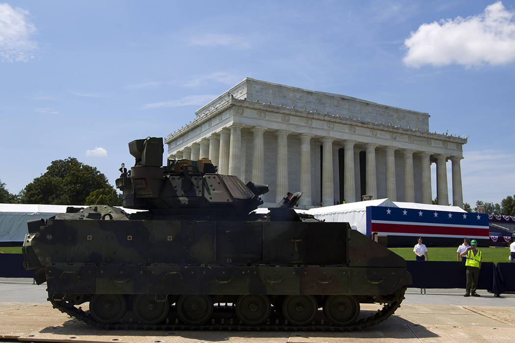 One of two Bradley Fighting Vehicles is driven into place in front of the Lincoln Memorial for ...