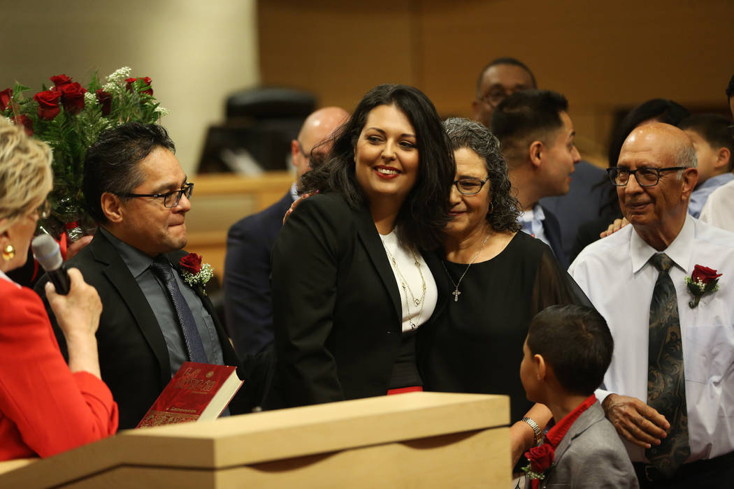 New Councilwoman Olivia Diaz, center, with her husband Frank, left, and her parents Alejandra O ...