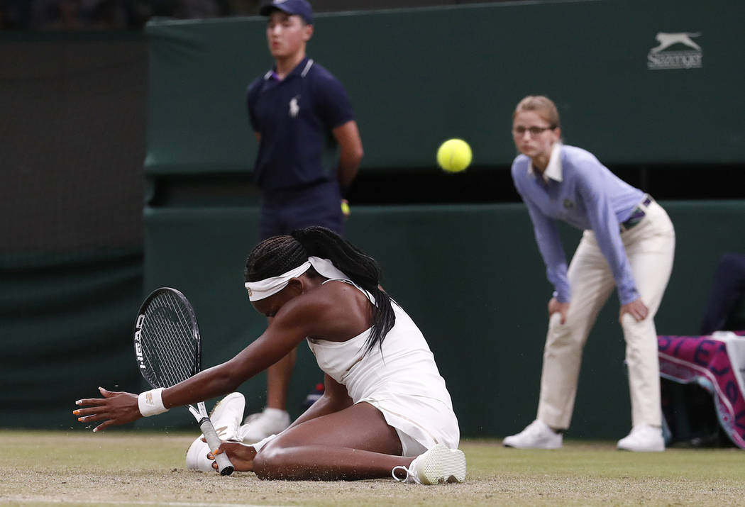 United States' Cori "Coco" Gauff slips after returning to Slovakia's Magdalena Rybaik ...