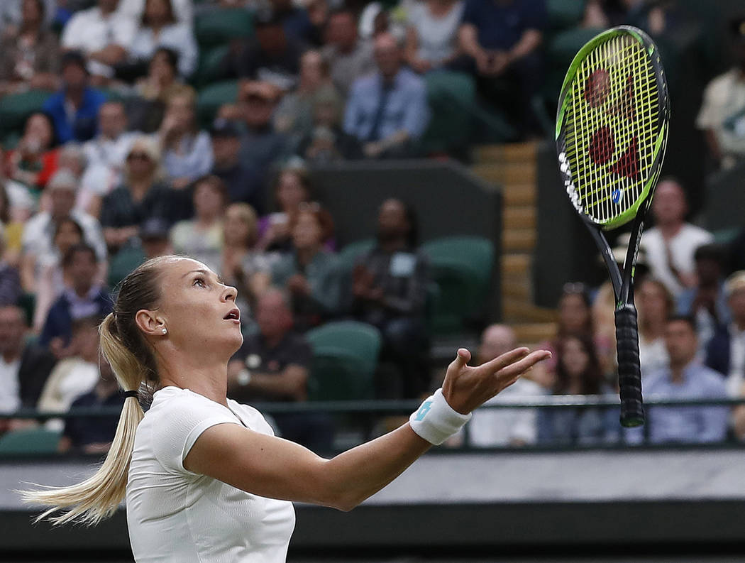 Slovakia's Magdalena Rybaikova tosses her racquet into the air after a shot to United States' C ...