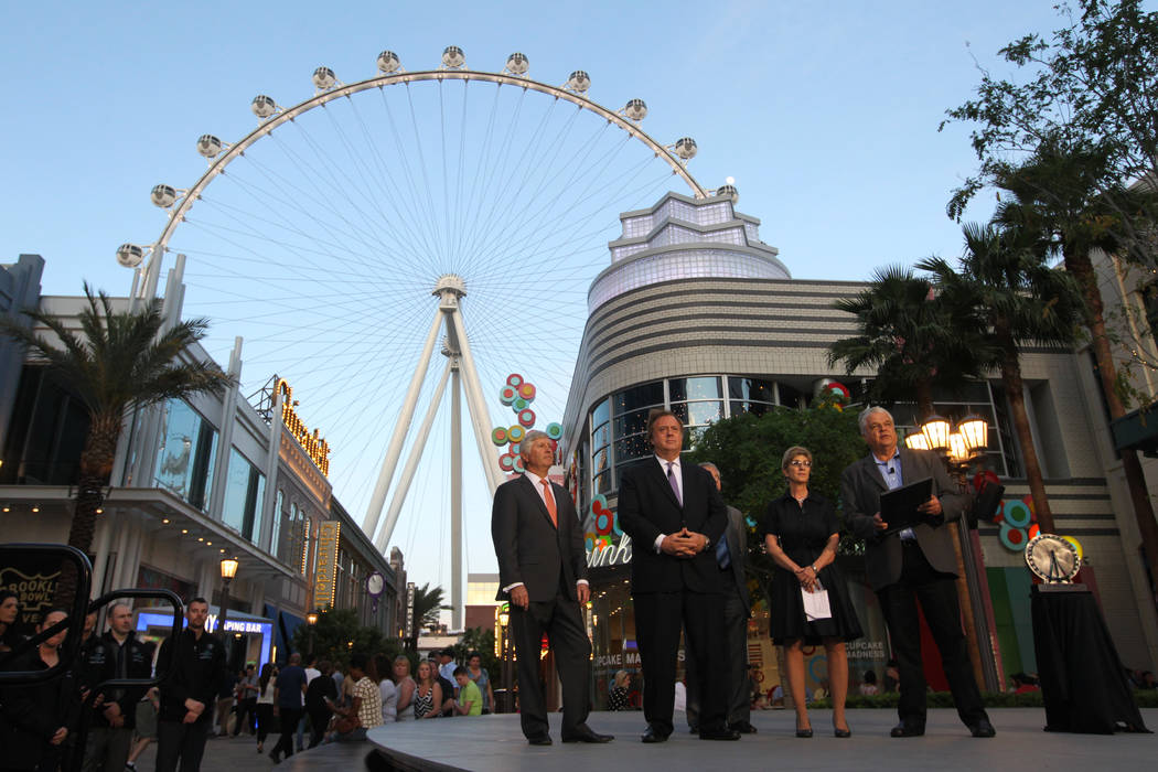 Clark County Commissioner Steve Sisolak, right, speaks during an event marking the one-year ann ...