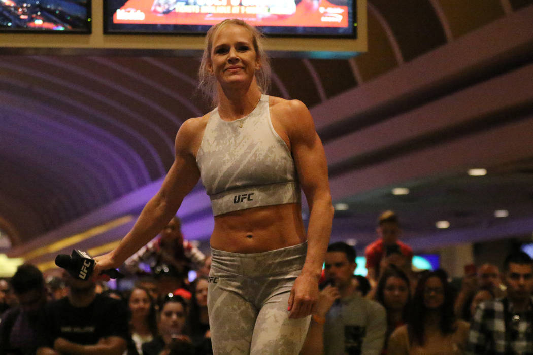 UFC bantamweight contender Holly Holm answers questions at the open workouts at the MGM Grand h ...