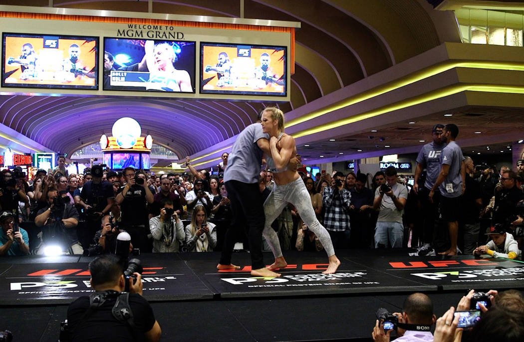 UFC bantamweight contender Holly Holm warms up at the open workouts at the MGM Grand hotel-casi ...