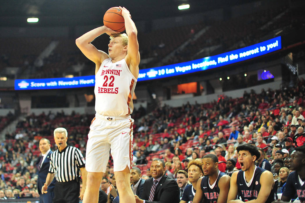 UNLV Rebels guard Trey Woodbury (22) takes a 3-point shot during the first half of a game betwe ...