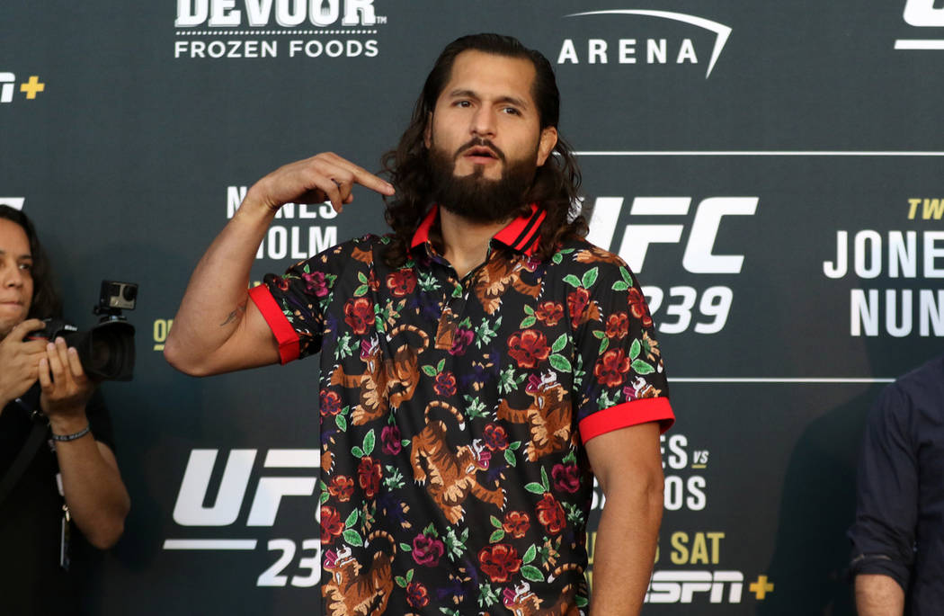 UFC welterweight Jorge Masvidal gestures after a staredown with his opponent, Ben Askren, not p ...