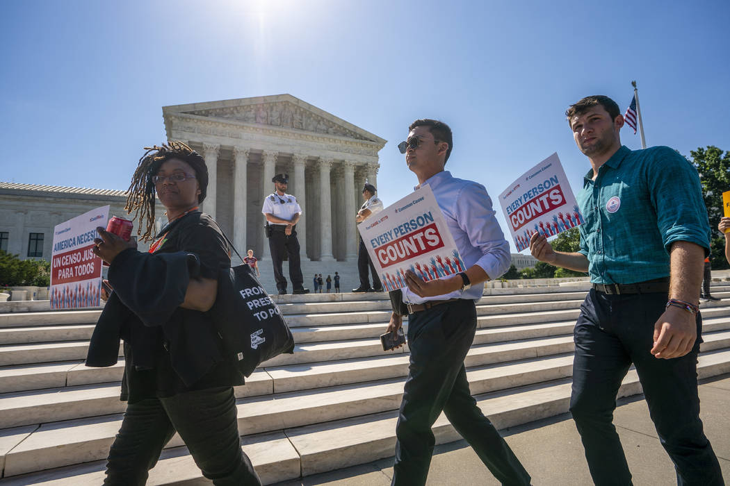 Demonstrators gather at the Supreme Court as the justices finish the term with key decisions on ...