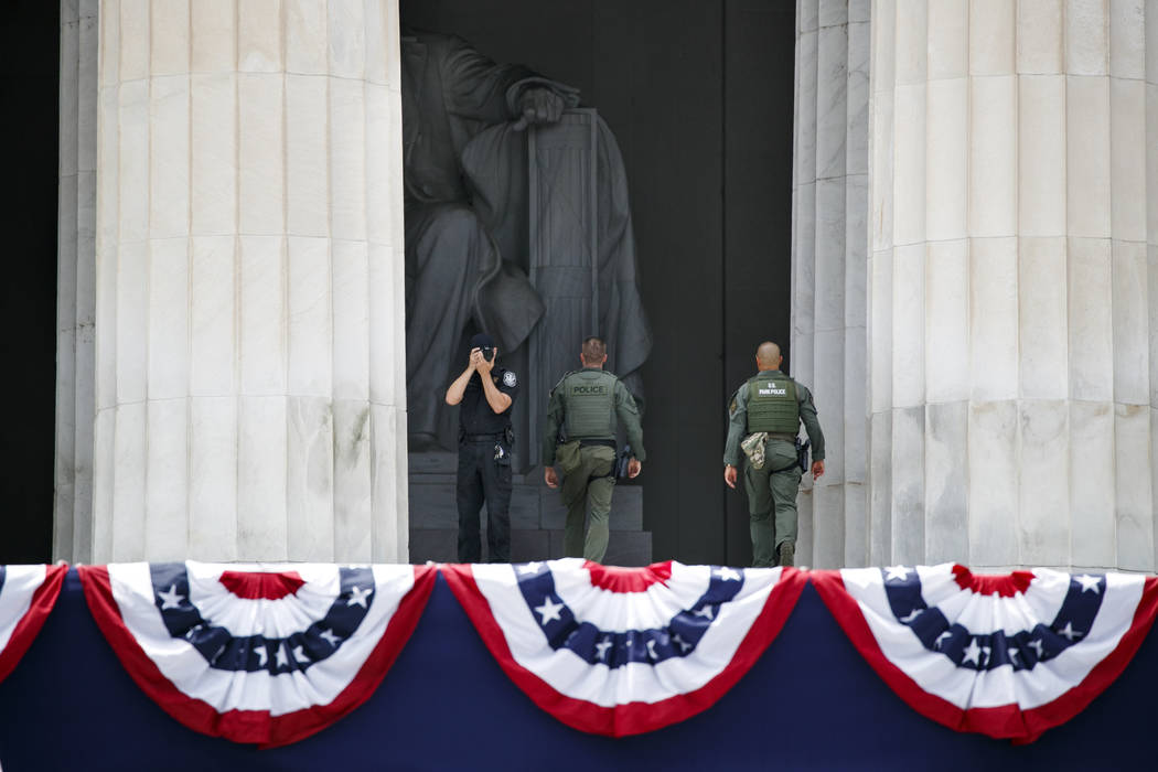 Police from various agencies work at the Lincoln Memorial as Fourth of July festivities are set ...