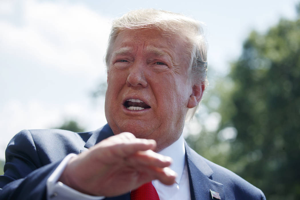 President Donald Trump talks to reporters on the South Lawn of the White House before departing ...