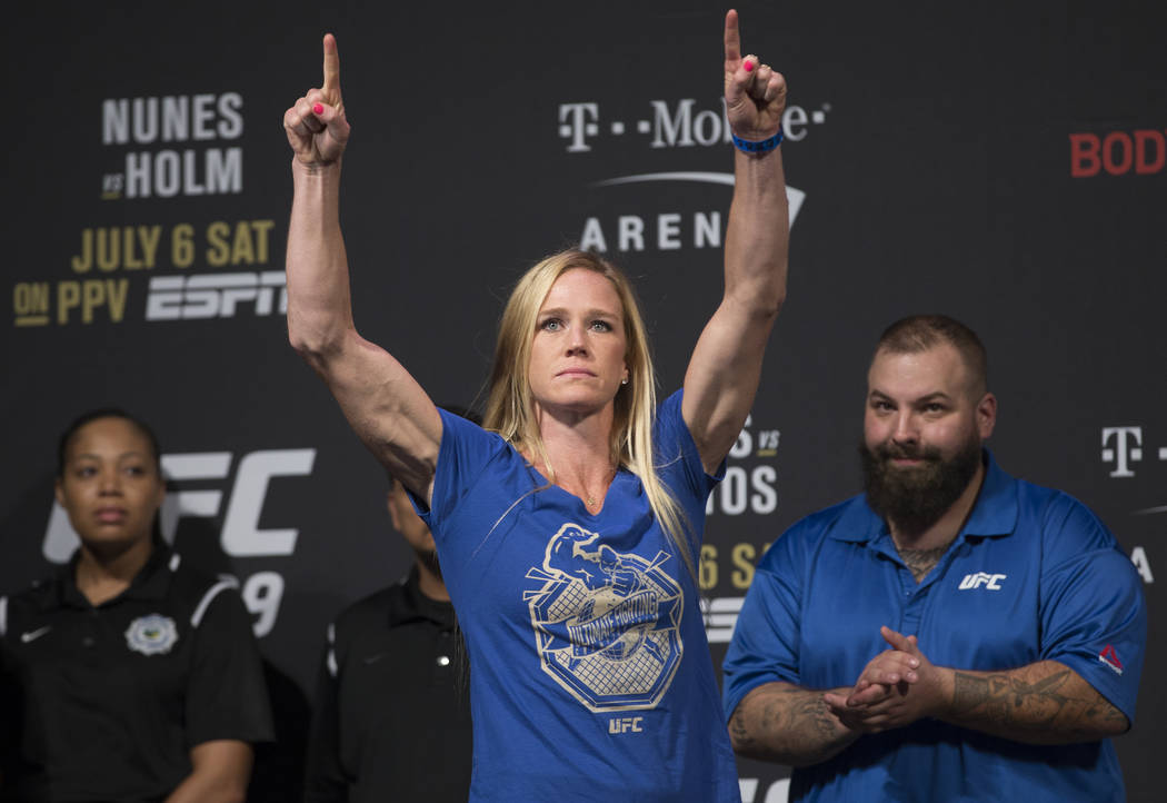 UFC bantamweight Holly Holm points to the crowd during weigh ins for UFC 239 on Friday, July 5, ...