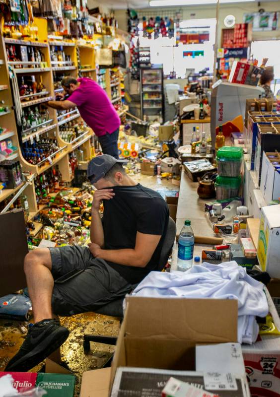 Ziad Abdullatif of the Eastridge Market Liquor Store is tired but still helping to run the fami ...