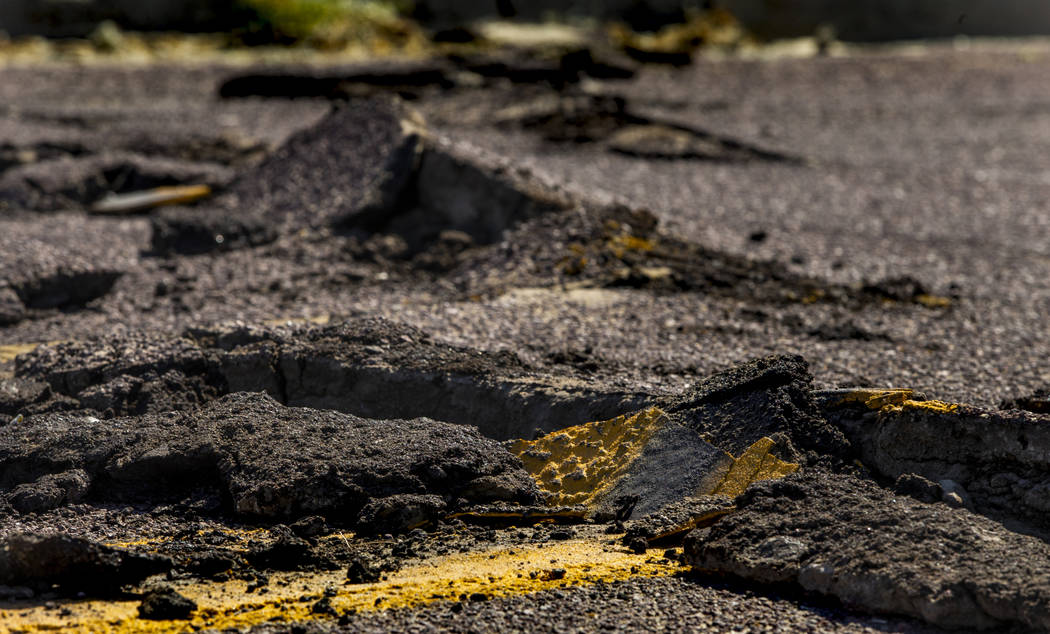 Extensive cracks with shifting pavement have opened up and forced road closures in Trona, CA., ...