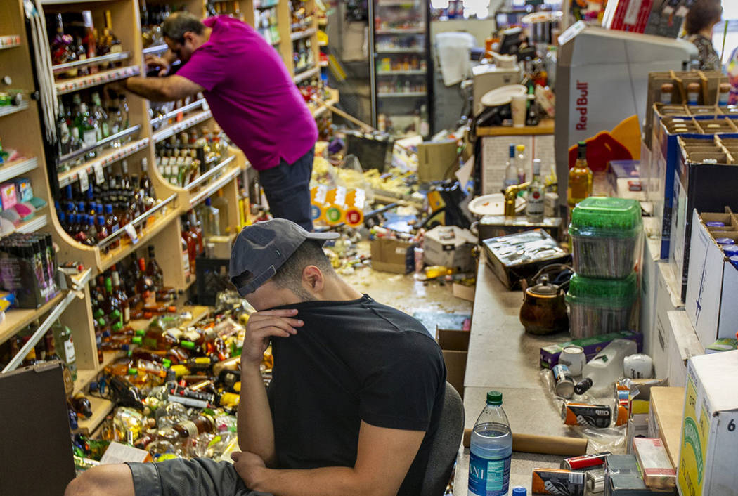 Ziad Abdullatif of the Eastridge Market Liquor Store is tired but still helping to run the fami ...