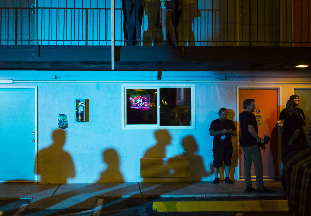 Attendees stand outside of the psychic room during the Jack Daniel's House No. 7, a pop-up expe ...